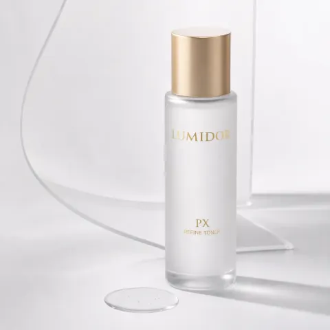 Lumidor PX Refine Toner obok kropli esencji
